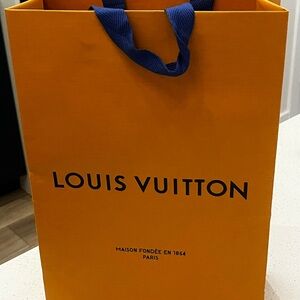 Louis Vuitton Bold Orange Bag with Black Lettering